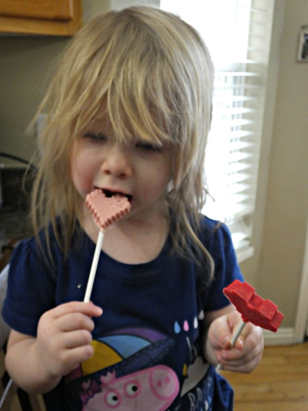 Bella enjoying 8-bit lollipops
